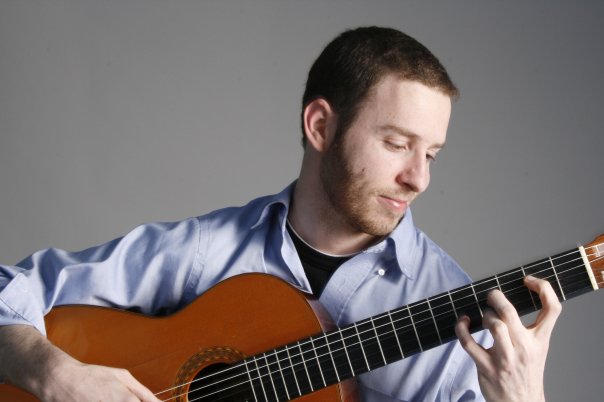 Tom playing guitar